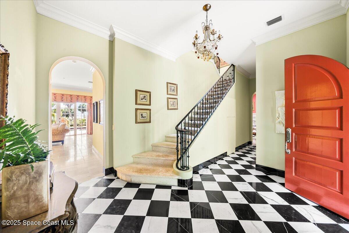 9340 South Tropical Trail Merritt Island, FL 32952 - Photo 20 of 100 a view of a entryway with a rug