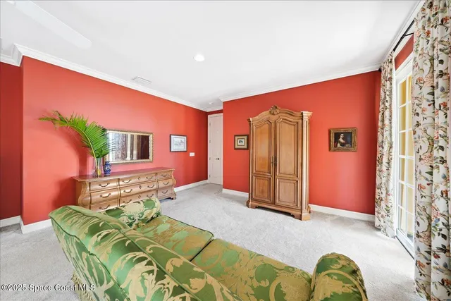 a view of a lake with houses in the back