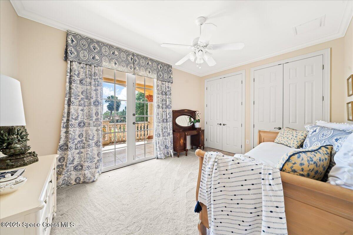 9340 South Tropical Trail Merritt Island, FL 32952 - Photo 53 of 100 a living room with furniture and a large window
