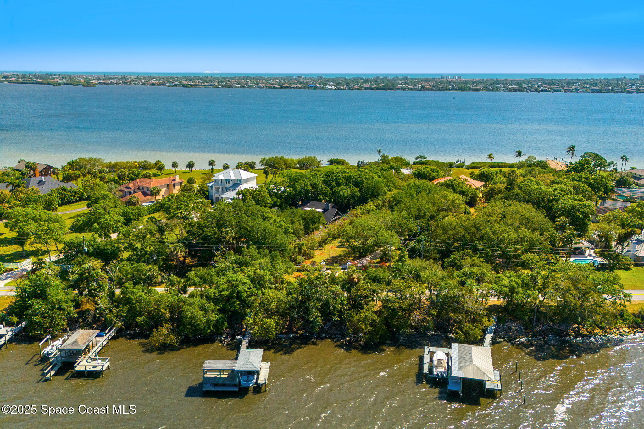 9340 South Tropical Trail Merritt Island, FL 32952 - Photo 87 of 100 54-web-or-mls-DJI_20250407110230_0030_D