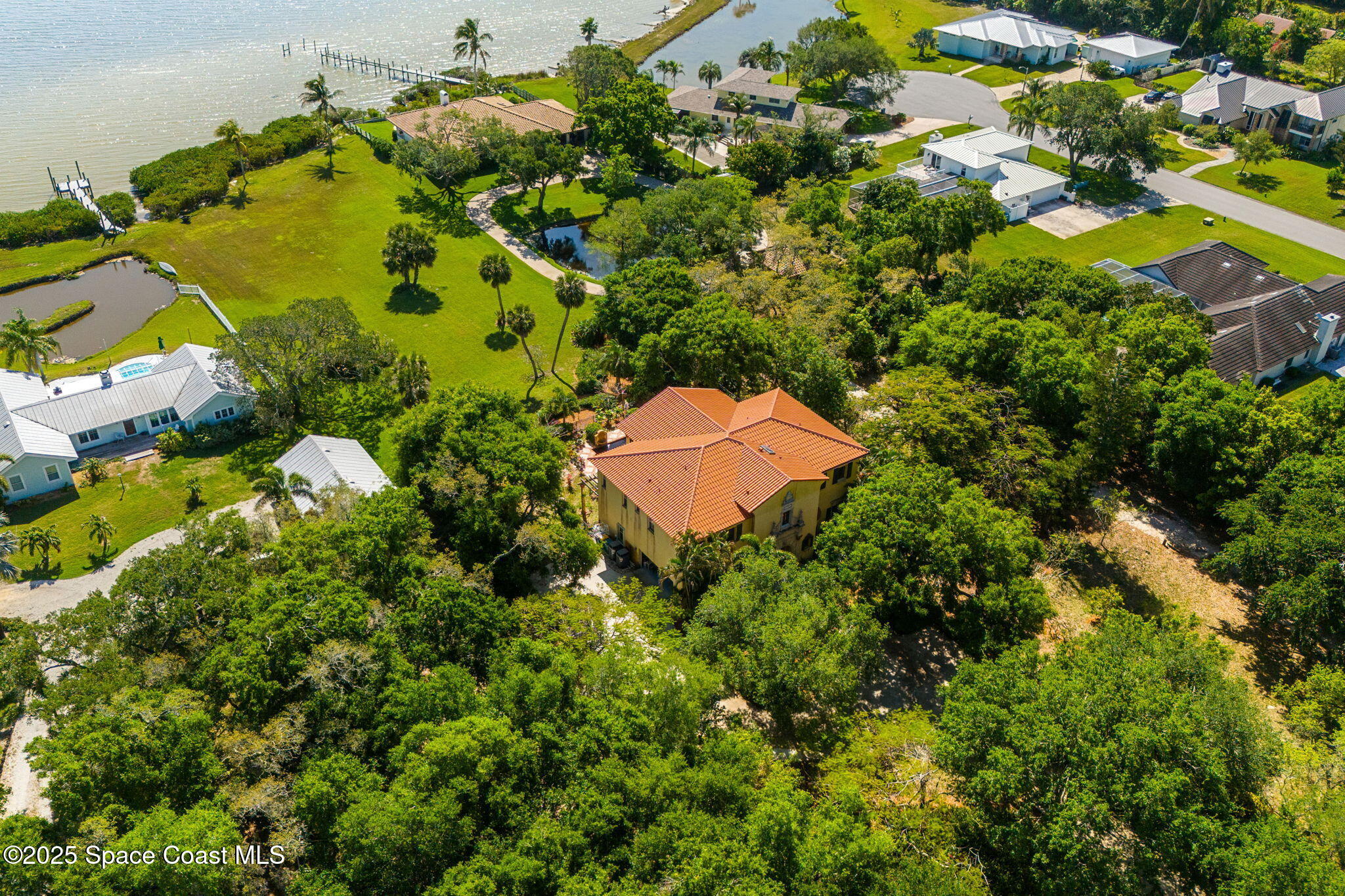 9340 South Tropical Trail Merritt Island, FL 32952 - Photo 93 of 100 16-web-or-mls-DJI_20250407110314_0031_D