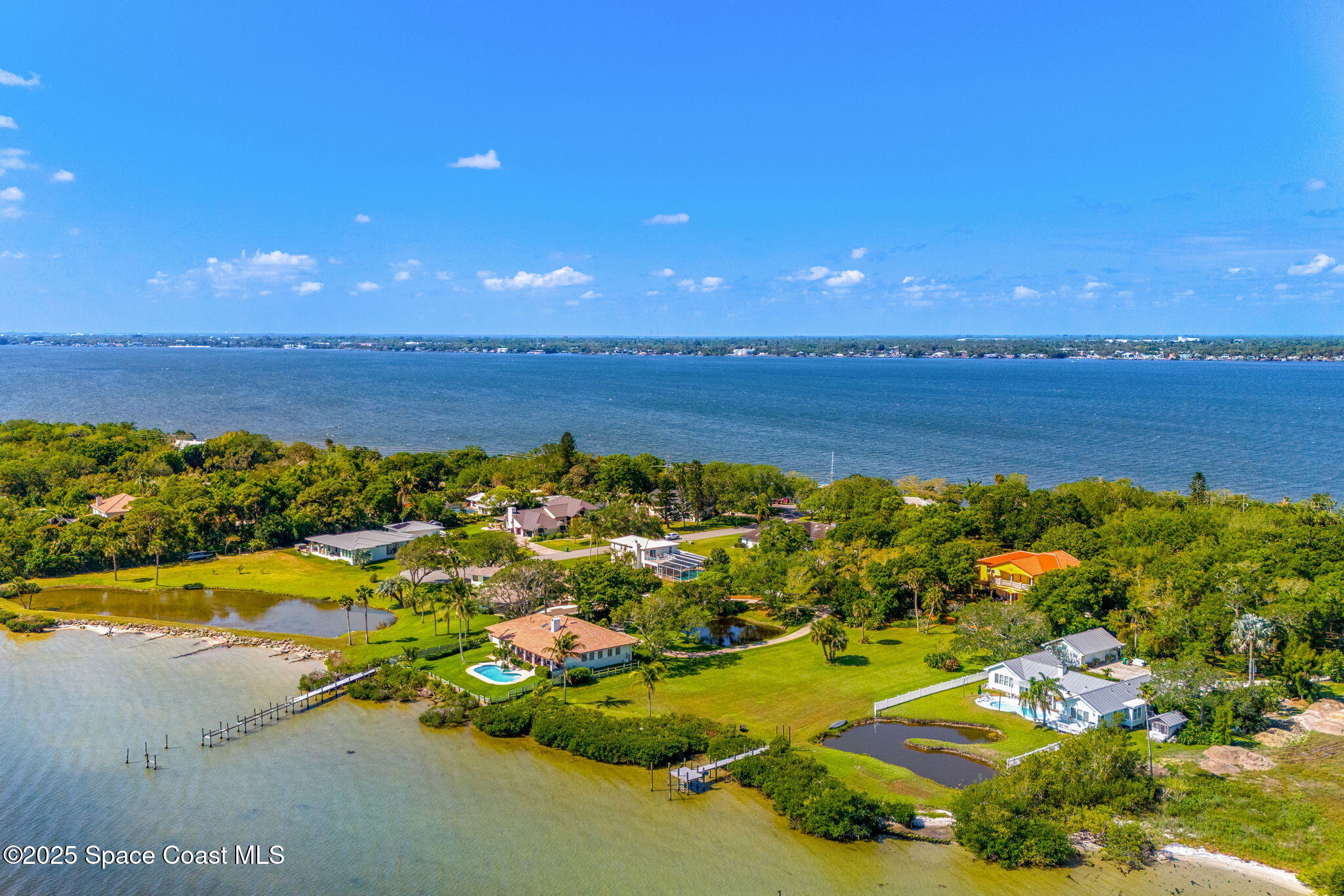 9340 South Tropical Trail Merritt Island, FL 32952 - Photo 100 of 100 59-web-or-mls-DJI_20250407110551_0036_D