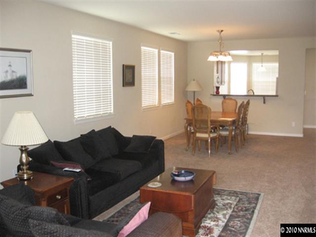 540 Little Sorrel Court Reno, NV 89521 - Photo 4 of 9 a living room with furniture and a window