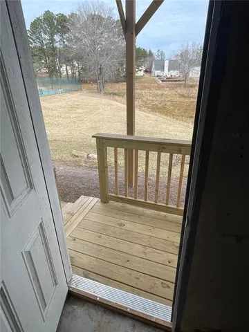a white toilet sitting next to a sink