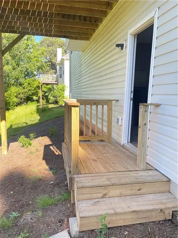 a bathroom with a granite countertop toilet sink and shower