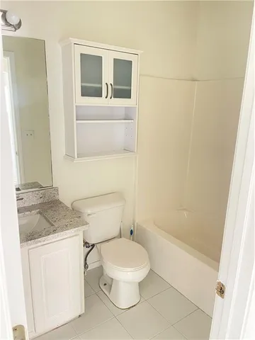 a view of a livingroom with wooden floor