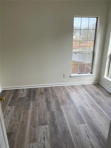 a view of a lake from a balcony