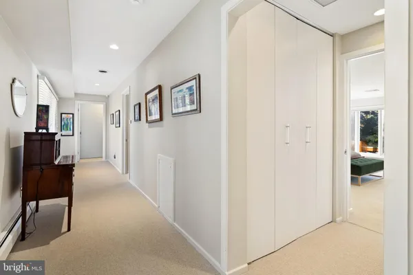 a bedroom with a bed and a television