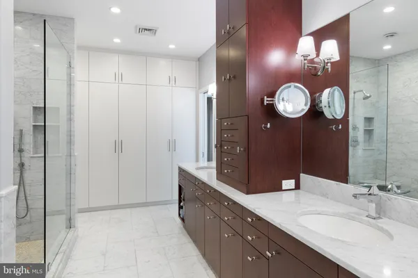 a bathroom with a shower and toilet
