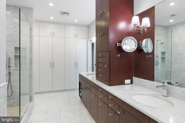 a bathroom with a shower and toilet