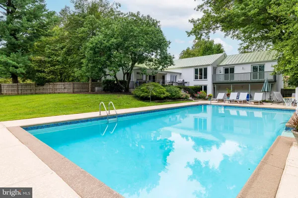 a view of outdoor space with deck and yard