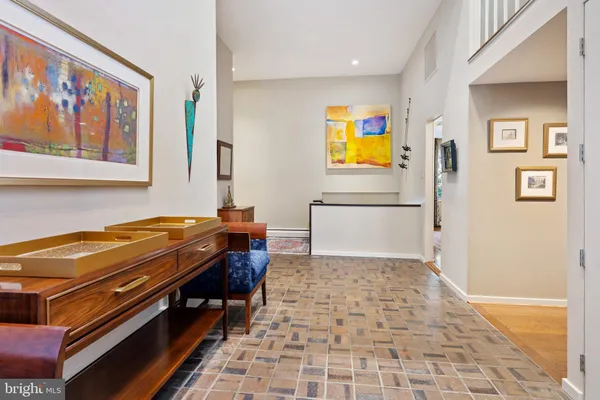 a room with furniture and a gate