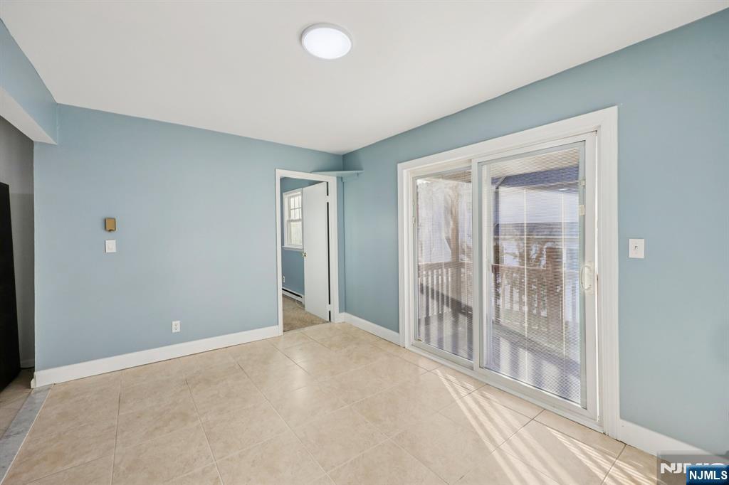 320 Orient Way, Unit 2 Rutherford, NJ 07070 - Photo 12 of 40 a view of an empty room with glass door