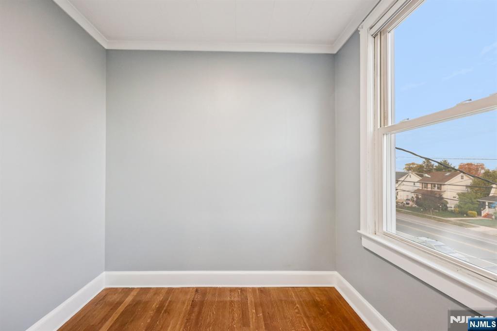 320 Orient Way, Unit 2 Rutherford, NJ 07070 - Photo 27 of 40 a view of room with window and wooden floor