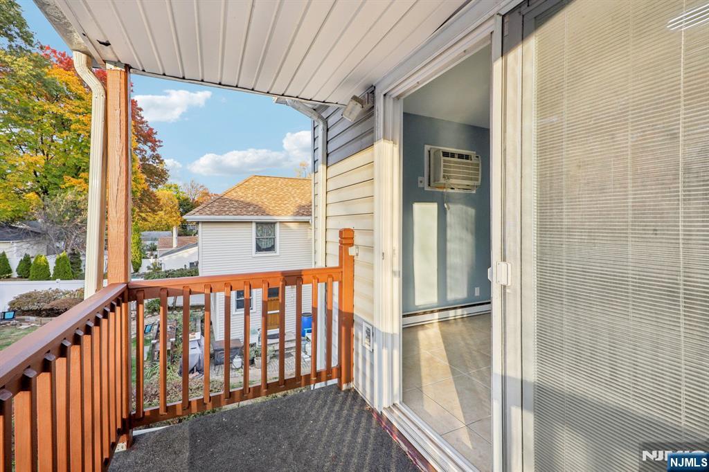 320 Orient Way, Unit 2 Rutherford, NJ 07070 - Photo 8 of 40 a view of a porch with wooden floor and outdoor space