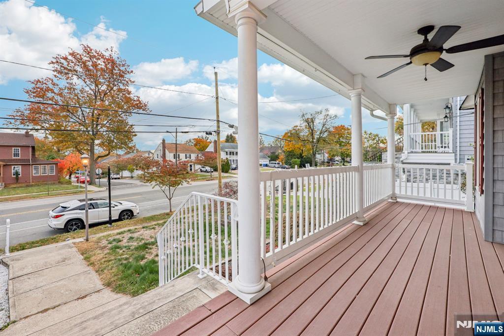 320 Orient Way, Unit 2 Rutherford, NJ 07070 - Photo 10 of 40 a view of a porch with wooden floor and outdoor seating