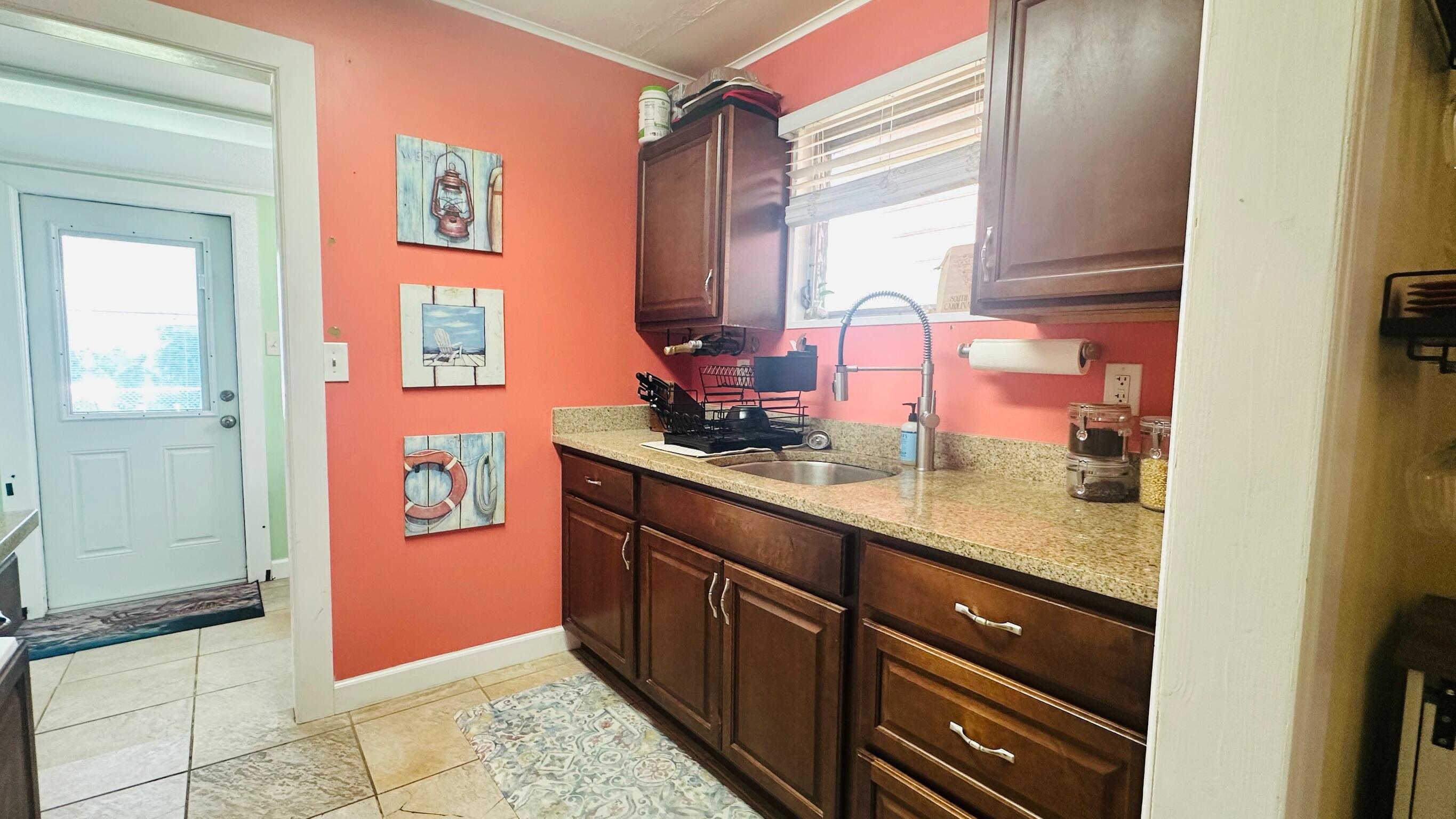 2500 Harris Avenue Key West, FL 33040 - Photo 13 of 22 a bath room with a sink and a mirror