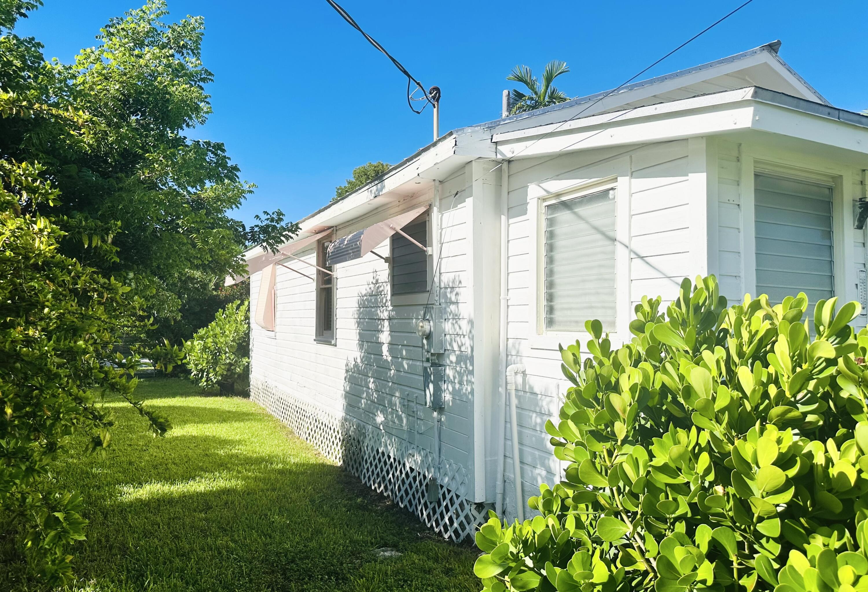 2500 Harris Avenue Key West, FL 33040 - Photo 16 of 22 a view of a house with a yard