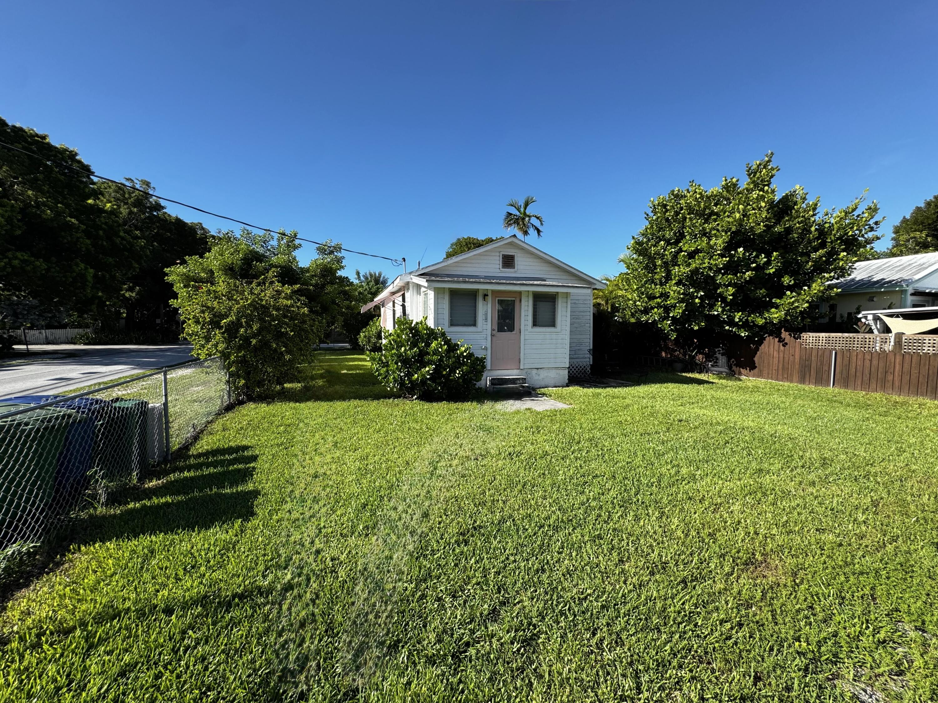 2500 Harris Avenue Key West, FL 33040 - Photo 20 of 22 a front view of a house with garden