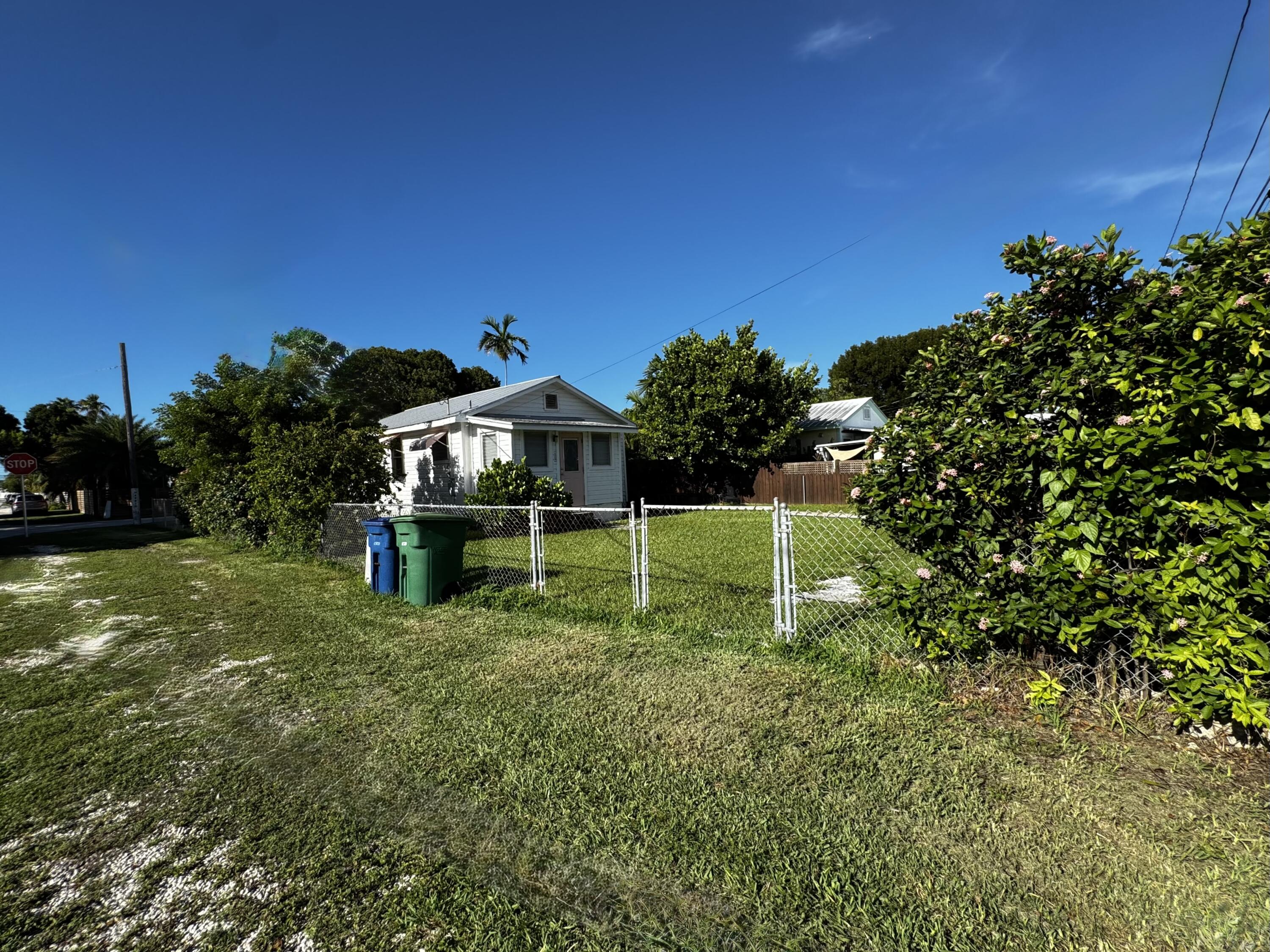 2500 Harris Avenue Key West, FL 33040 - Photo 22 of 22 a green field with lots of trees in front of it