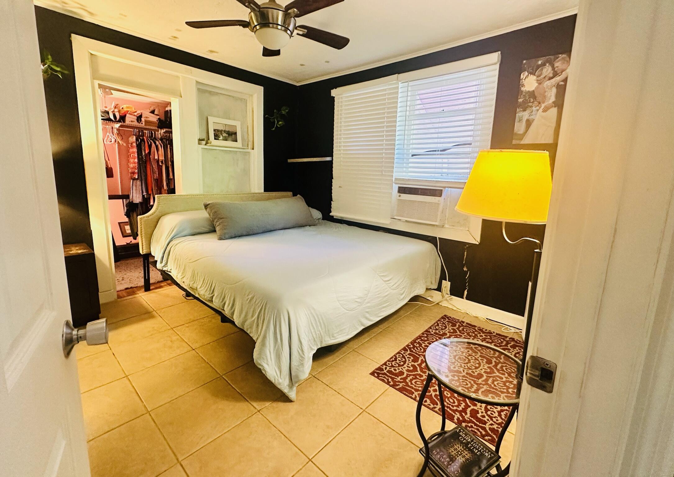 2500 Harris Avenue Key West, FL 33040 - Photo 5 of 22 a bedroom with a bed and wall painting