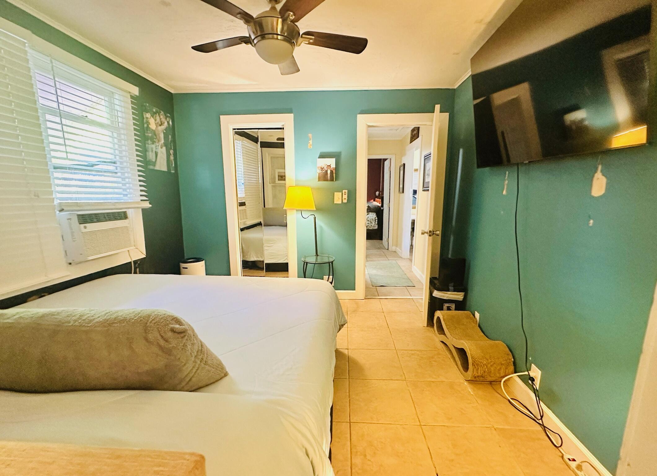 2500 Harris Avenue Key West, FL 33040 - Photo 6 of 22 a bedroom with a bed and a television
