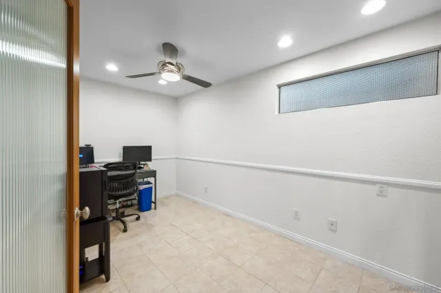 a view of a workspace with furniture