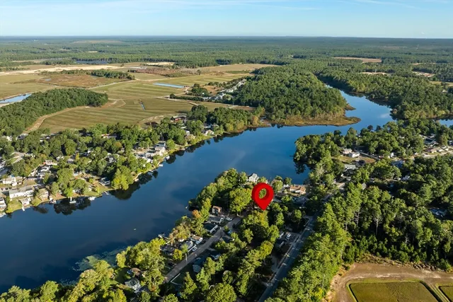 a view of a lake with a building in the background