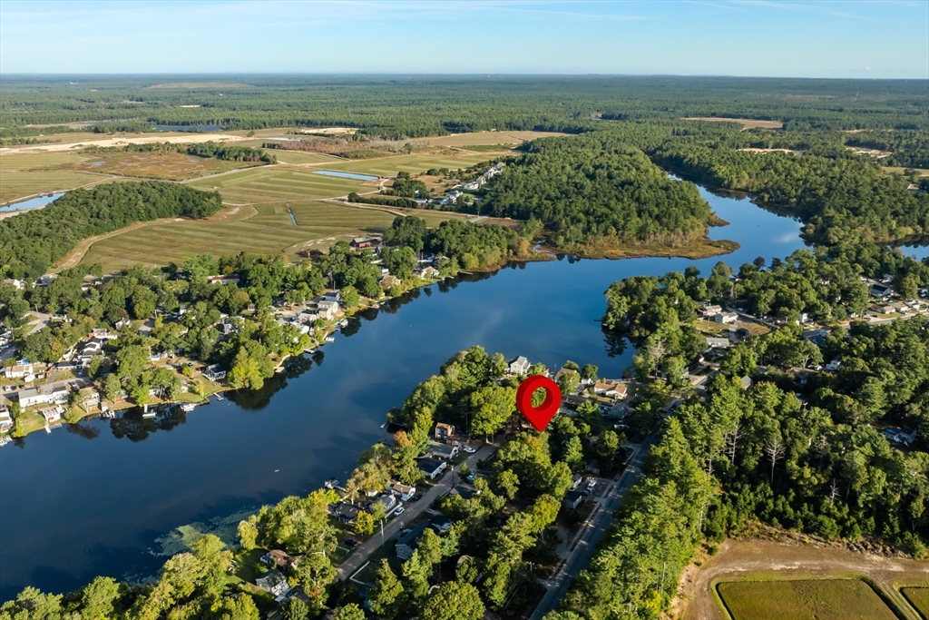 a view of a lake with a building in the background