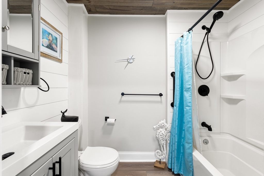 25 Lakeview Drive Wareham, MA 02538 - Photo 27 of 31 a bathroom with a sink a toilet and shower