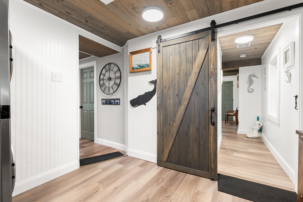 25 Lakeview Drive Wareham, MA 02538 - Photo 28 of 31 a view of a hallway with wooden floor and entryway