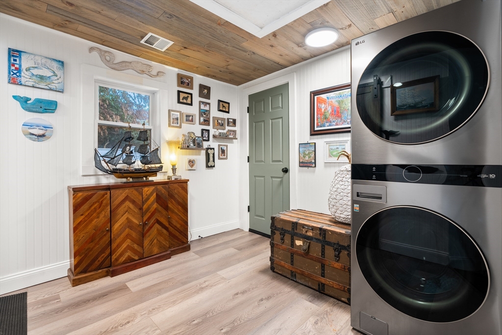 25 Lakeview Drive Wareham, MA 02538 - Photo 29 of 31 a view of a living room with washer and dryer