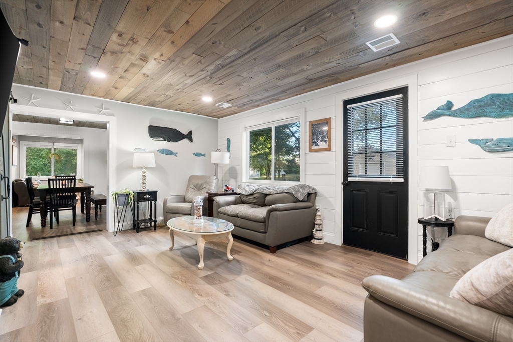 25 Lakeview Drive Wareham, MA 02538 - Photo 9 of 31 a living room with furniture and large window