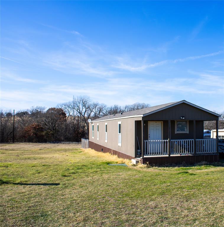 145 Firefly Drive Springtown, TX 76082 - Photo 3 of 16 a view of a terrace