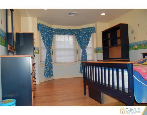 12 Ramsey Road Edison, NJ 08820 - Photo 20 of 25 a view of a living room and entryway