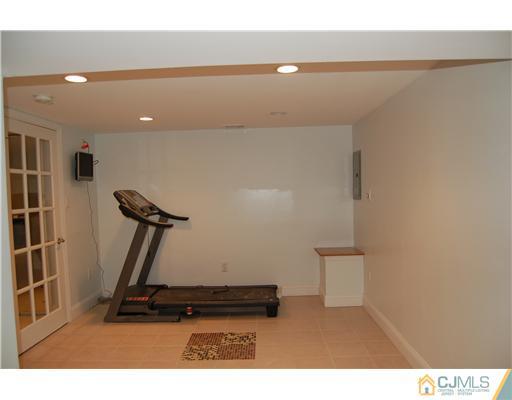12 Ramsey Road Edison, NJ 08820 - Photo 23 of 25 a room with gym equipment