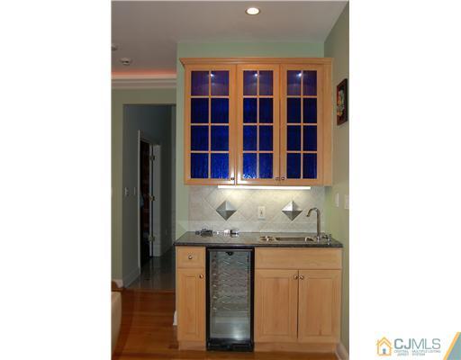 12 Ramsey Road Edison, NJ 08820 - Photo 10 of 25 a kitchen with a sink and cabinets