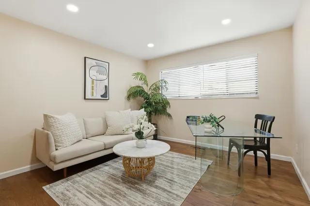 a bedroom with a bed and with furniture