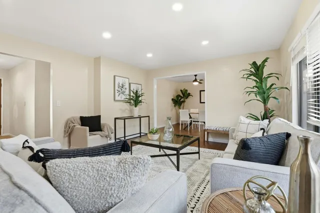 a kitchen that has a sink and a stove
