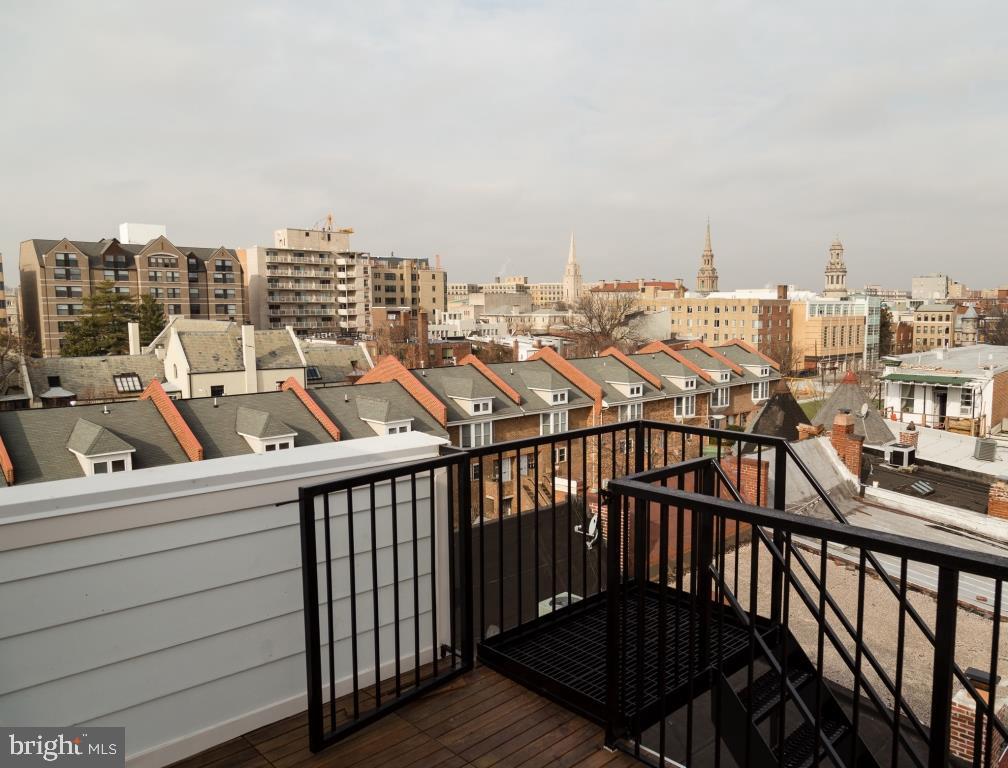 1443 Euclid Street Northwest, Unit 8 Washington, DC 20009 - Photo 20 of 20 a view of a balcony with city view