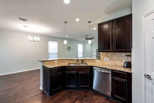 a kitchen with window and natural light