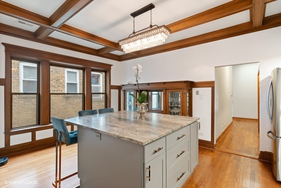4070 North Sheridan Road, Unit 3 Chicago, IL 60613 - Photo 10 of 21 a view of entryway and hall with wooden floor