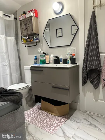 a living room with a couch and a table