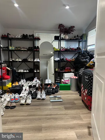 a store room with lots of different colored cloths