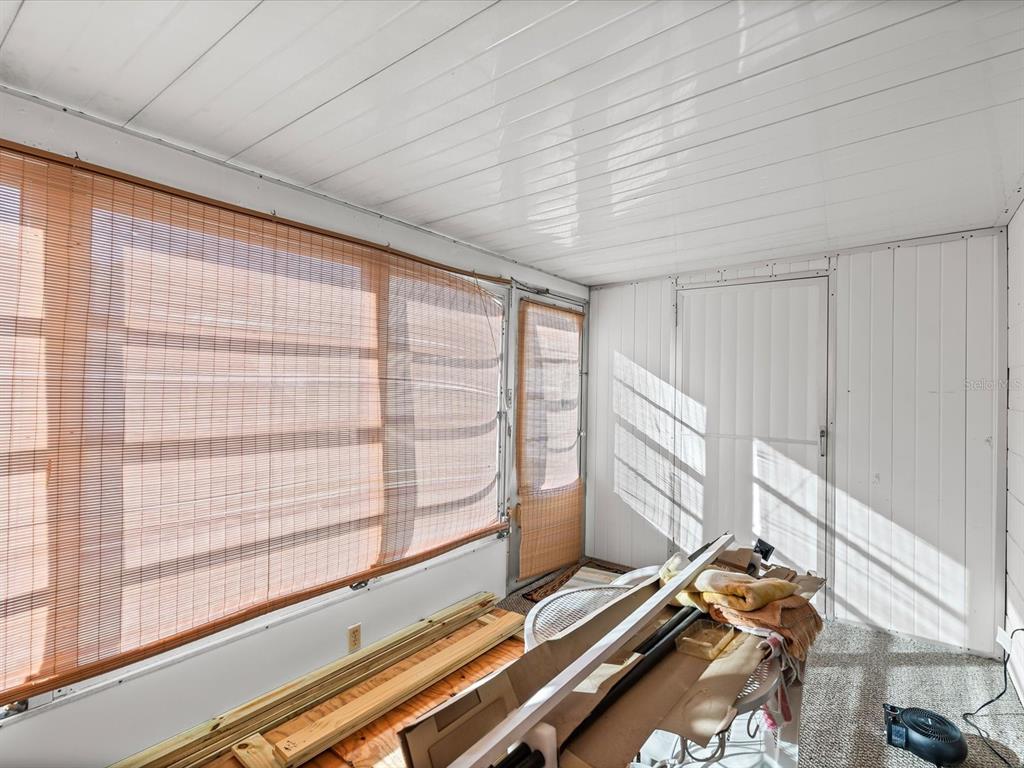 11735 Boynton Lane, Unit 11735 New Port Richey, FL 34654 - Photo 19 of 25 a view of a room with gym equipment