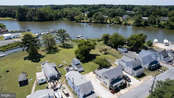 an aerial view of residential house with outdoor space