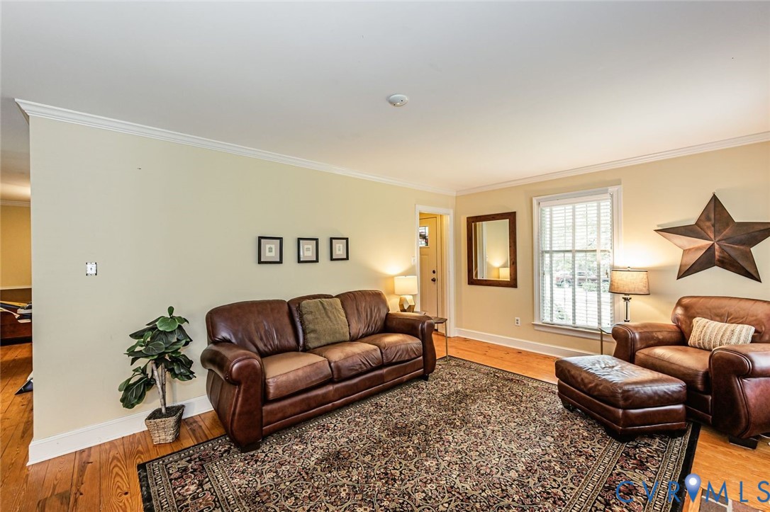 7300 Old Roxbury Road Quinton, VA 23141 - Photo 21 of 89 Hardwood flooring, crown molding, and recessed lig