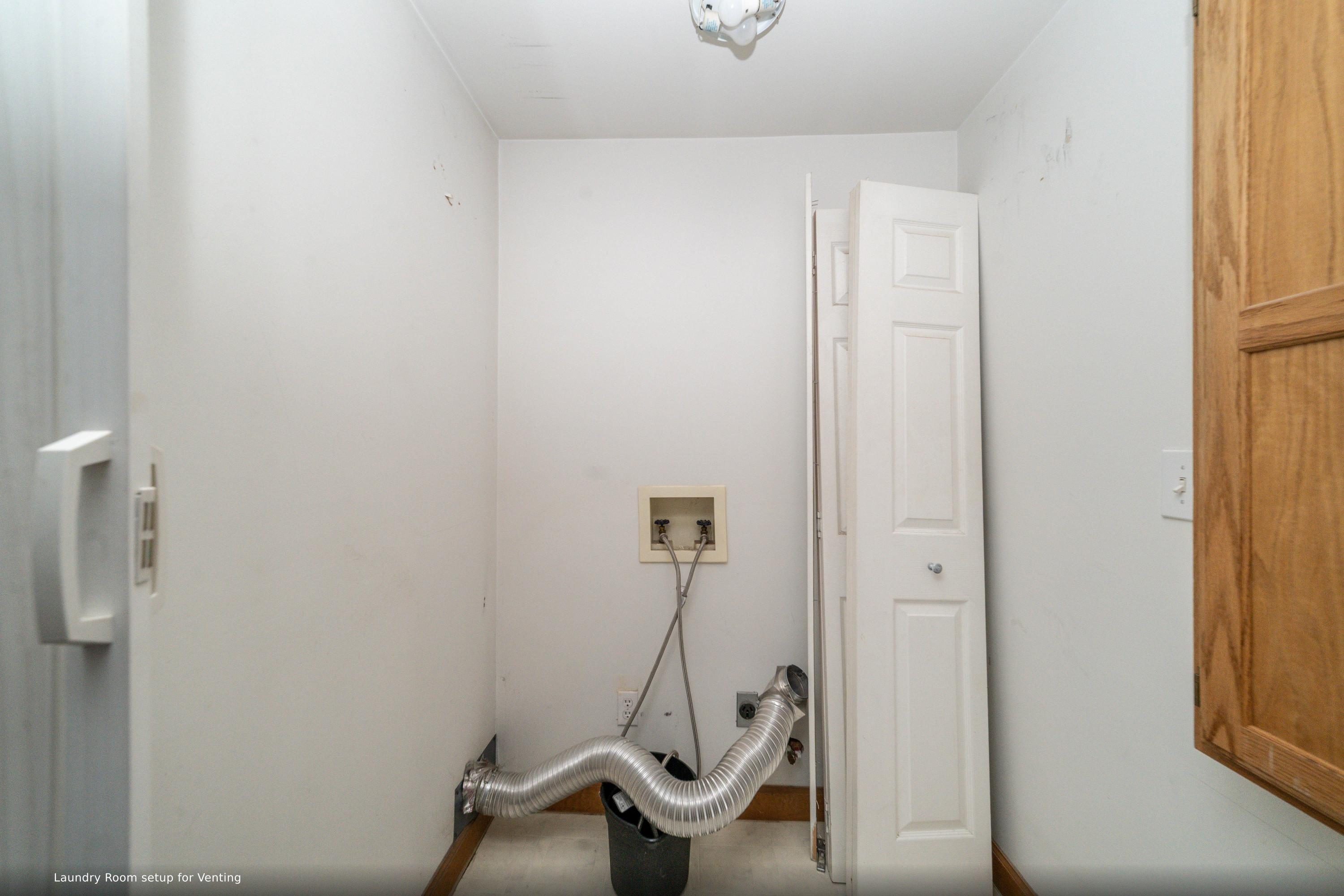 14521 Merriman Road Livonia, MI 48154 - Photo 28 of 33 livonia-mi-laundry-room-2