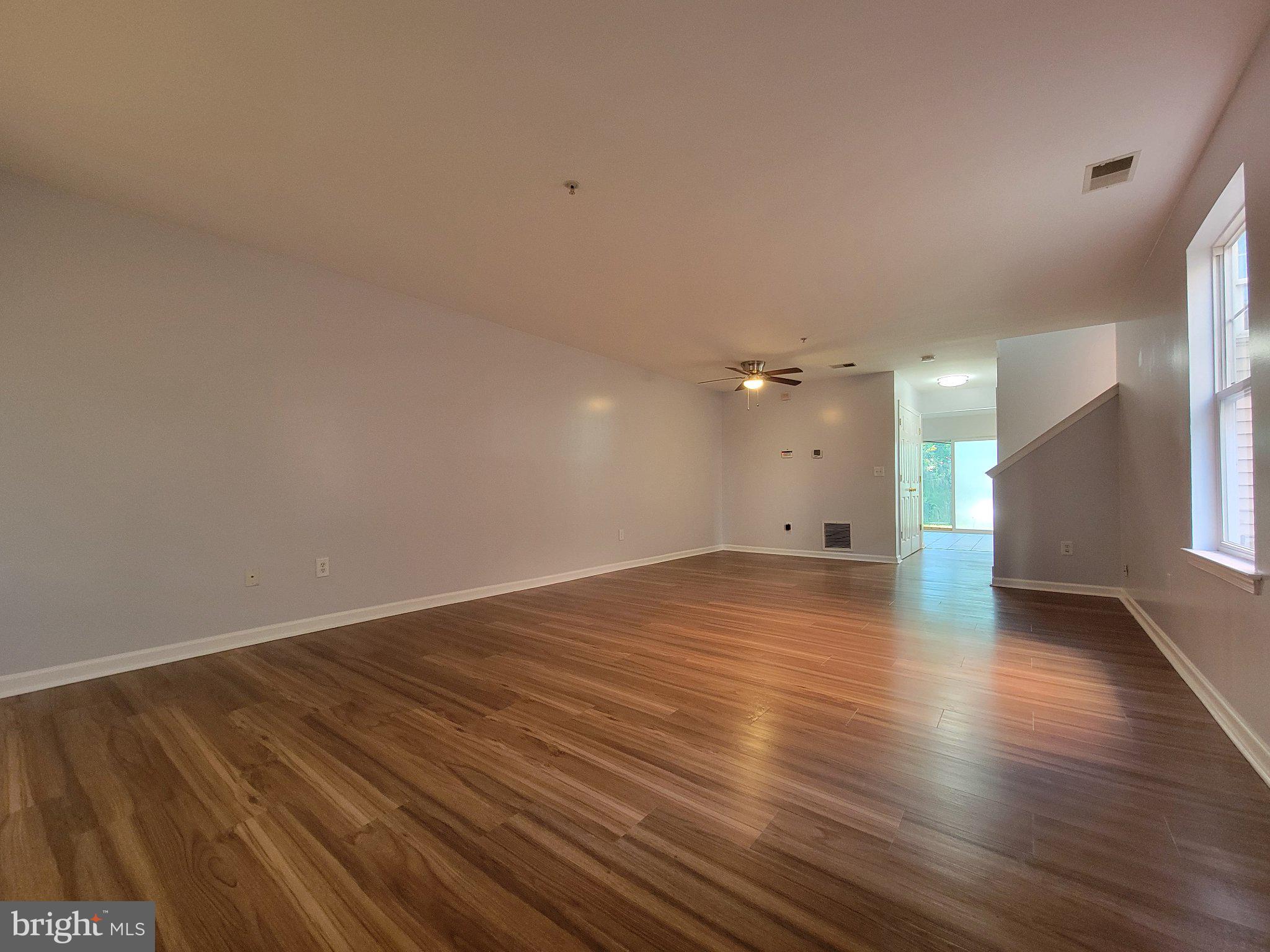 97 Spring Street Trenton, NJ 08618 - Photo 2 of 16 Spacious, sunlit living area awaits you.