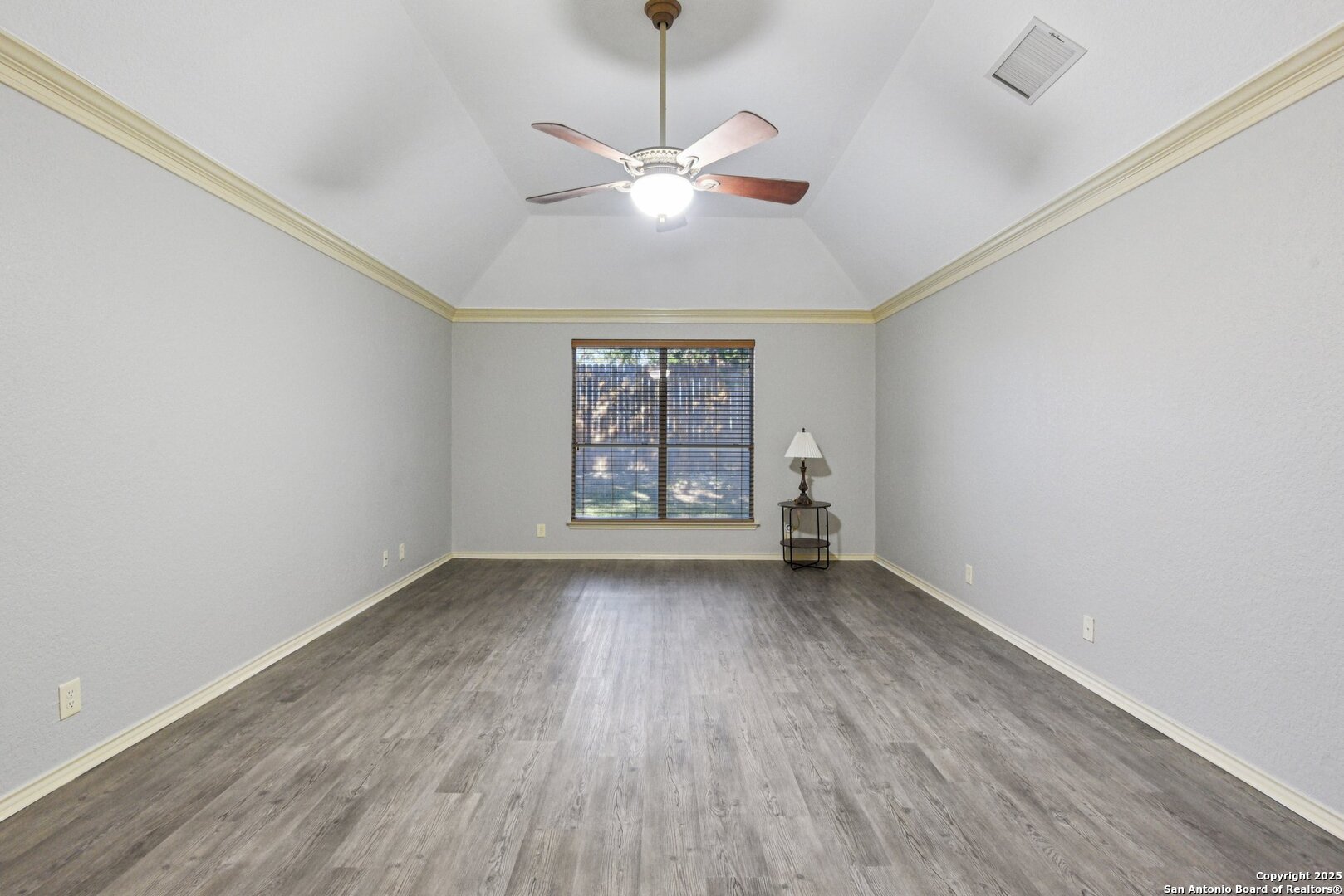 3524 Angora Trail Schertz, TX 78154 - Photo 14 of 25 wooden floor in an empty room with a window